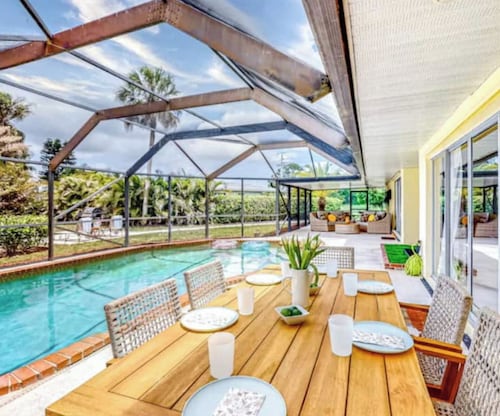 Spacious 4BR Lakefront Getaway – Heated Pool, Hot Tub  Near Everything!