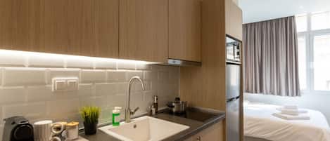 Fridge, microwave, stovetop, coffee/tea maker