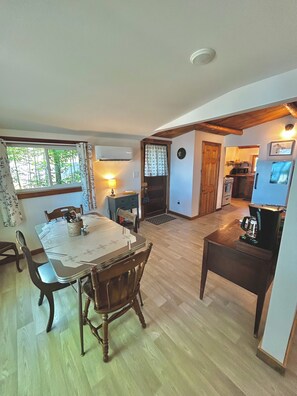 Dining - Cozy waterfront cabin in delightful Brimley with WiFi, AC, sand beach (Brimley)