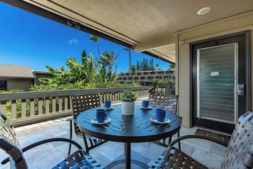 Enjoy meals outside at your lanai dining table for four.