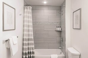 Shower, hair dryer, towels, shampoo