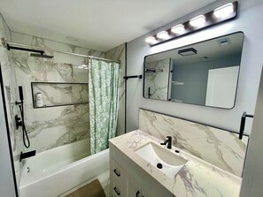 Shower, hair dryer, bidet, towels