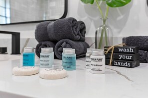 Hair dryer, towels, soap, toilet paper