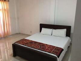 Desk, laptop workspace, iron/ironing board