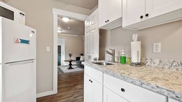 Economy House, Non Smoking, Air conditioning | Private kitchenette | Full-sized fridge, microwave, stovetop, cookware/dishes/utensils