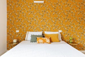 1 bedroom, desk, iron/ironing board, travel crib