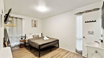 Economy Bungalow, Air conditioning, Garden View | 2 bedrooms, desk, laptop workspace, blackout drapes