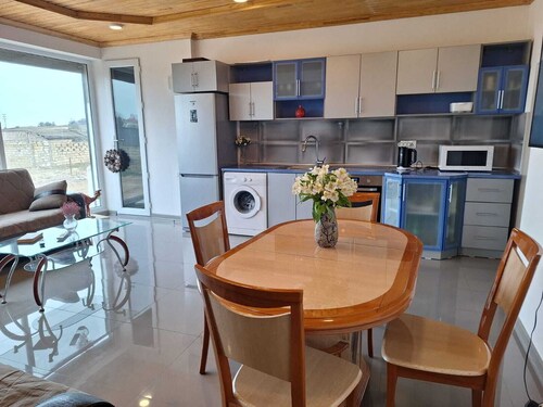 Cozy villa near beach with luxe perks, garden, and easy city access
