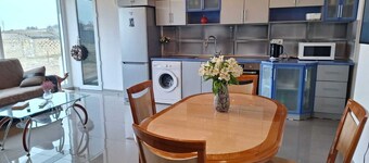 Cozy villa near beach with luxe perks, garden, and easy city access