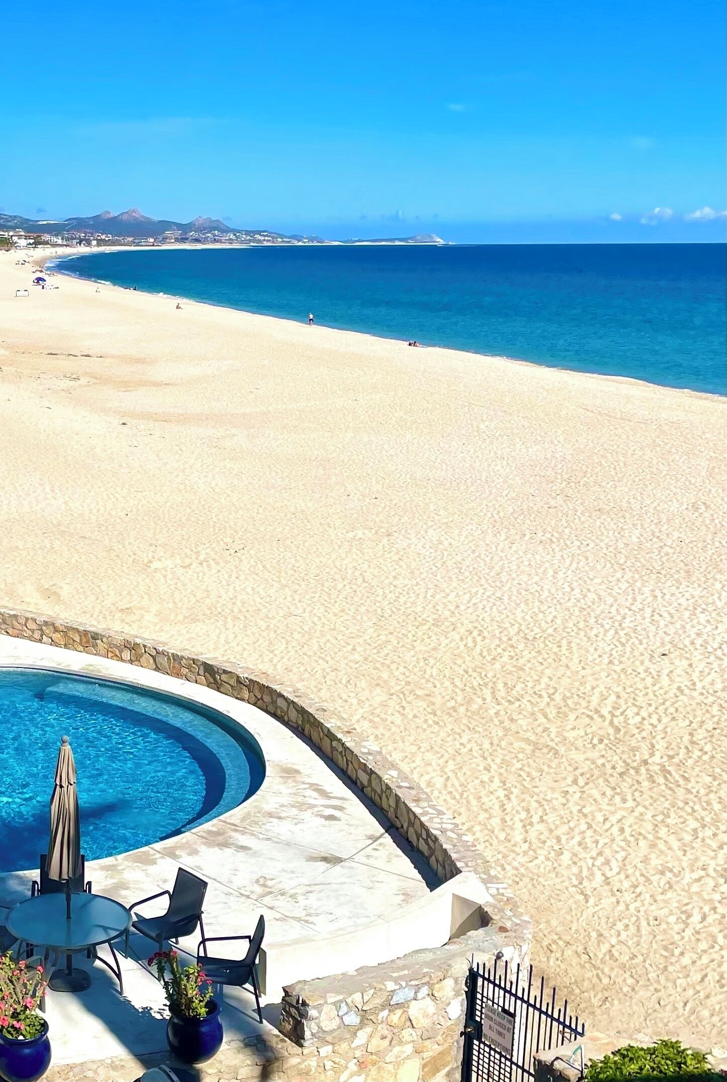 On the beach, sun loungers, beach towels