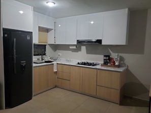 Fridge, microwave, coffee/tea maker, blender