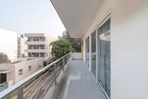 Comfort Double Room, Balcony, City View | Desk, laptop workspace, blackout drapes, rollaway beds