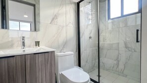 Shower, hair dryer, towels, soap