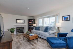 Smart TV, fireplace, books