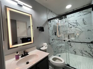 Hair dryer, towels, soap, toilet paper