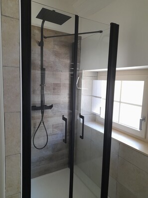 Shower, hair dryer, towels, soap