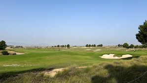 A golf course with sand bunkers, a clear sky, and distant mountains. - Pet friendly apartment in Torrevieja with WiFi (Torrevieja)