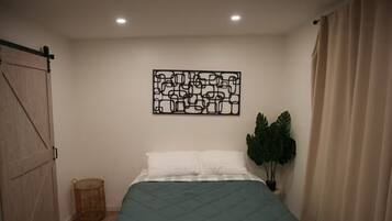 1 dormitorio, tabla de planchar con plancha, wifi y ropa de cama