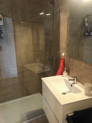 Shower, bidet, towels, soap