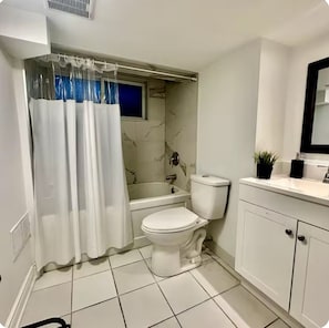 Hair dryer, towels, soap, shampoo