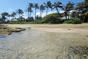 The beach right in front of the house is ideal for little ones who just want to splash around and play without the concern of big waves. Grown-ups can relax in a chair or float in the calm, shallow water. And when the sun goes down, the fun continues with