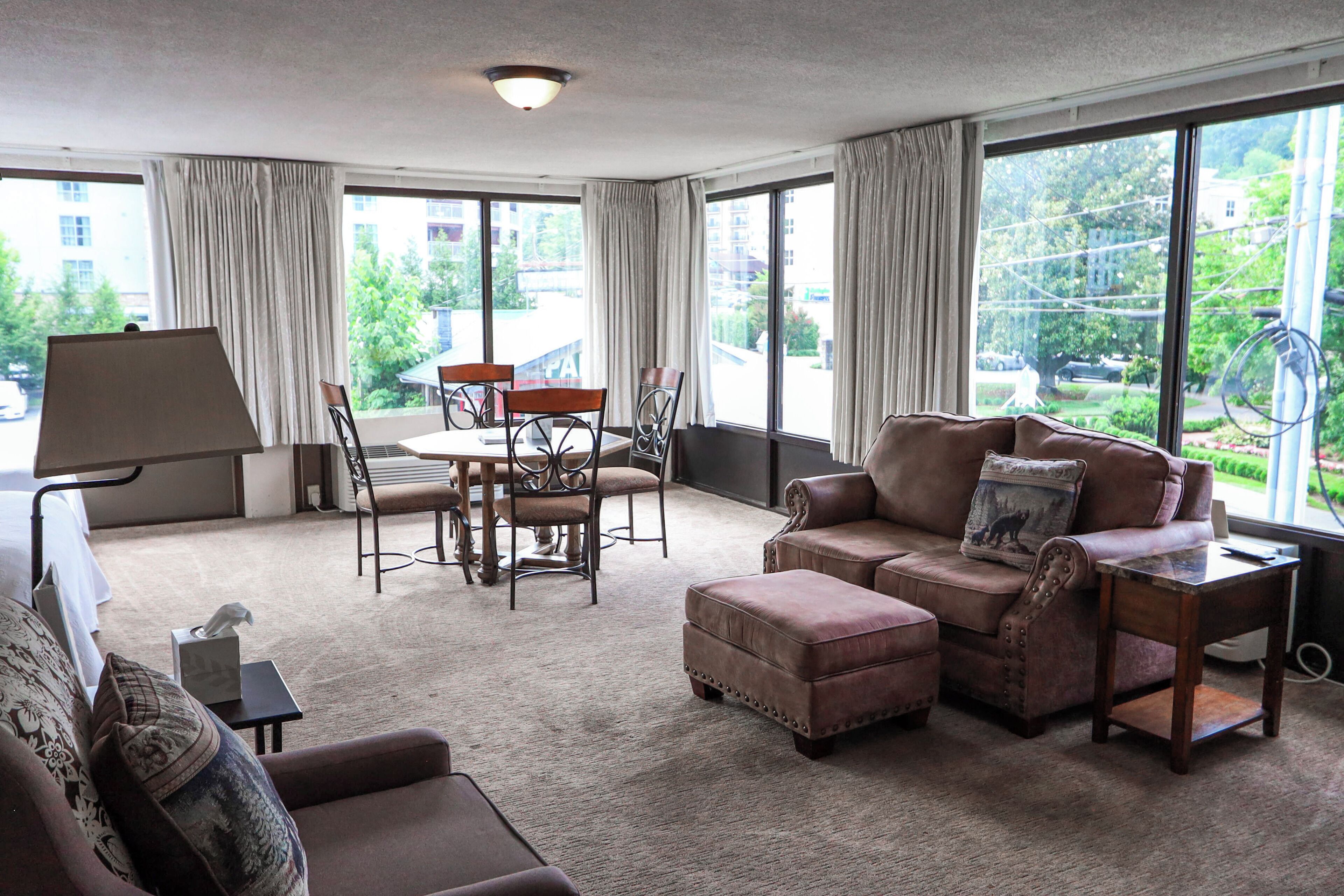 Suite, 2 Double Beds | Desk, laptop workspace, blackout drapes, iron/ironing board