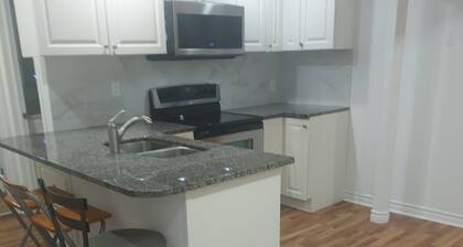 2 Bedroom Basement Apartment For Rent.