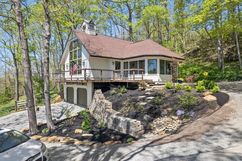 Unique and secluded A frame home on 31 acres with hot tub.