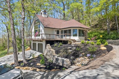 Unique and secluded A frame home on 31 acres with hot tub.