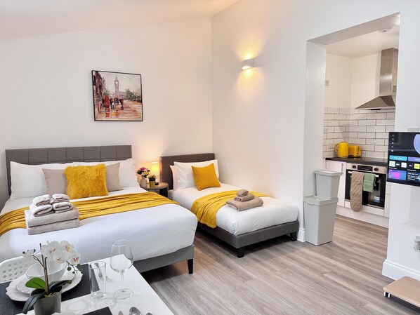 1 habitación, tabla de planchar con plancha, wifi y ropa de cama
