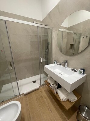 Superior Quadruple Room, Balcony, City View | Bathroom | Shower, hair dryer, slippers, towels - Maison Museo Mann (Naples)