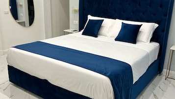 Superior Quadruple Room, Balcony, Courtyard View | Minibar, in-room safe, desk, blackout curtains
