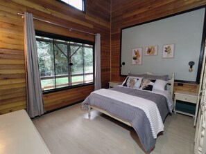 Romantic Cabin, River View | Iron/ironing board, free WiFi