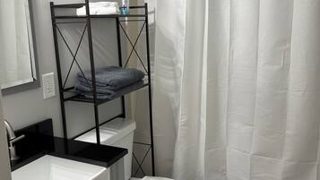 Hair dryer, towels, soap, toilet paper