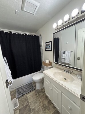 Hair dryer, towels, soap, shampoo