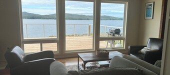 Private Beachfront 3 bedroom + loft, 5 bed, huge deck. 2 bath, WiFi, barbecue.