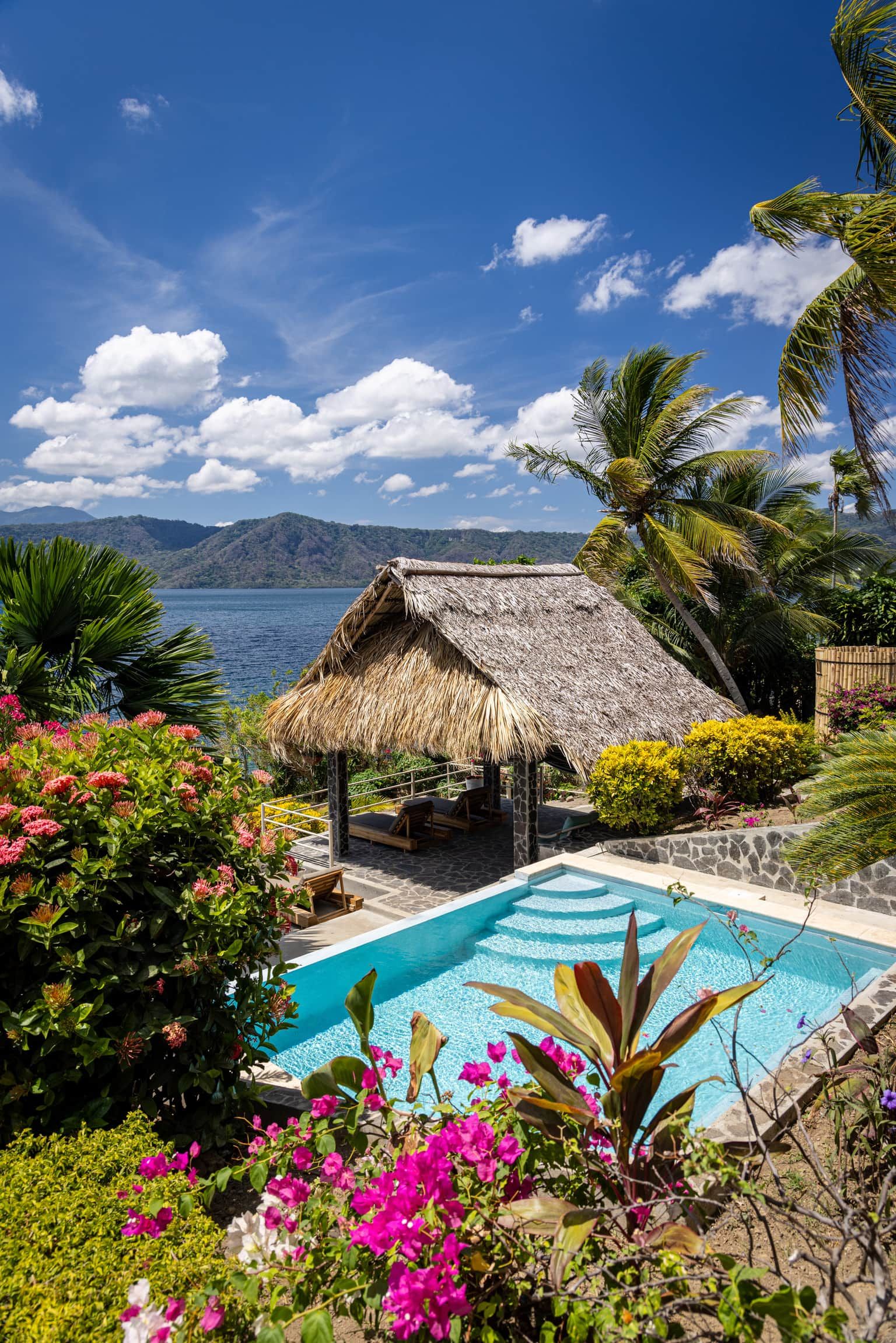 Private pool and shaded palapa surrounded by tropical gardens