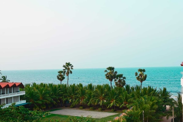 Deluxe tweepersoonskamer, uitzicht op het strand | Terras