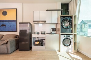 Signature Studio Suite, 1 King Bed with Sofa bed | Blackout curtains, soundproofing, iron/ironing board, free WiFi - Home by CR Concept in The Center (Ho Chi Minh City)