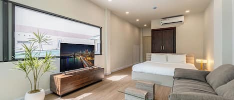 Suite monolocale Signature, 1 letto king con divano letto | Tende oscuranti, insonorizzazione, ferro/asse da stiro, Wi-Fi gratuito
