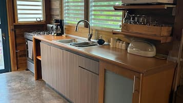 Fridge, microwave, stovetop, coffee/tea maker