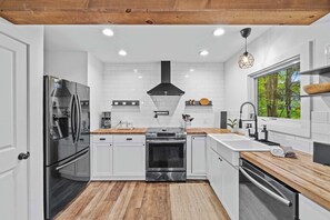 Fridge, microwave, oven, stovetop - Dog-Friendly Pocono Chalet w/ Hot Tub, Indoor Pool (Long Pond)