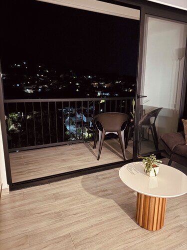 Modern Condo - Beautiful City & Volcano Views - 5 min to WTC & Top Places