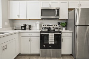 Fridge, stovetop, coffee/tea maker, toaster