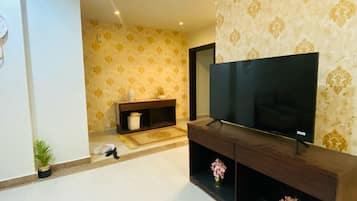 Appartement Supérieur, balcon, vue jardin | Coin séjour