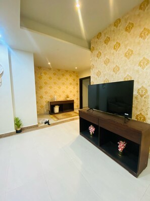 Appartement Supérieur, balcon, vue jardin | Coin séjour