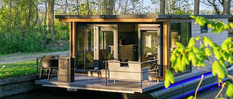 Luxury Cabin, 2 Bedrooms, Kitchen, Harbor View | Minibar, in-room safe, individually decorated, individually furnished