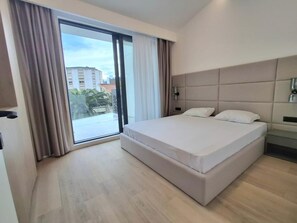 Luxury Apartment, Balcony, City View | Individually decorated, individually furnished, desk, laptop workspace