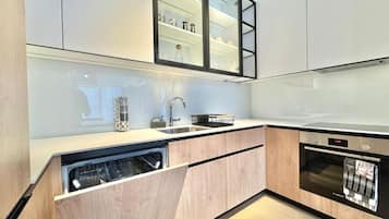 Deluxe Apartment, 1 Bedroom | Private kitchen | Coffee/tea maker, electric kettle