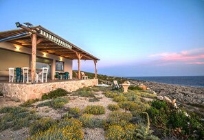Outdoor dining - WHITE ROCK CAVE VILLA-WHITE ROCK CAVE VILLA (zakynthos)
